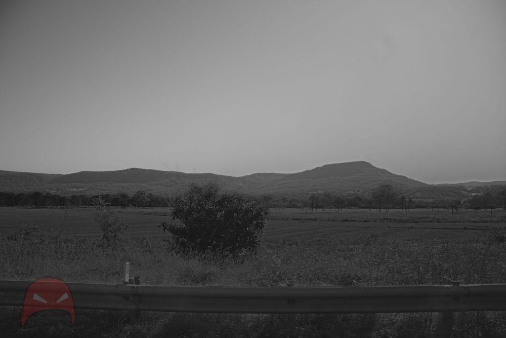 Monochrome image of Mount Kemble across a field